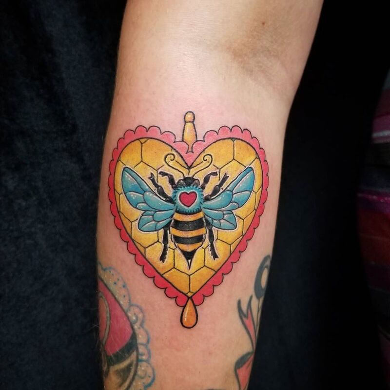 Heart bee tattoo done at Overlord Tattoo Studio Miami Beach
