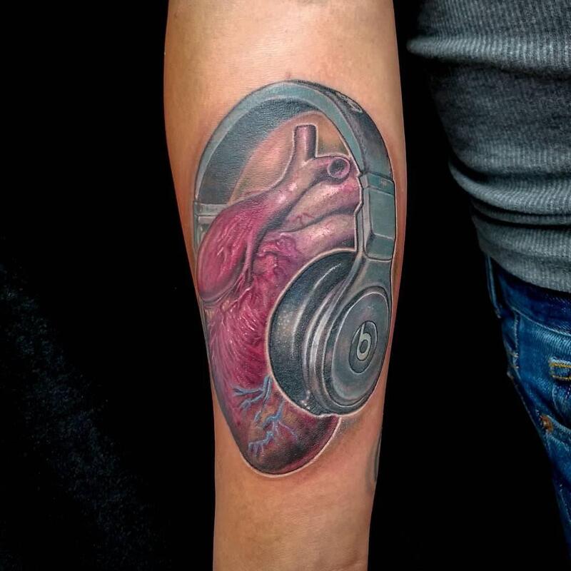 Heart tattoo,headphones,Overlord tattoo shop