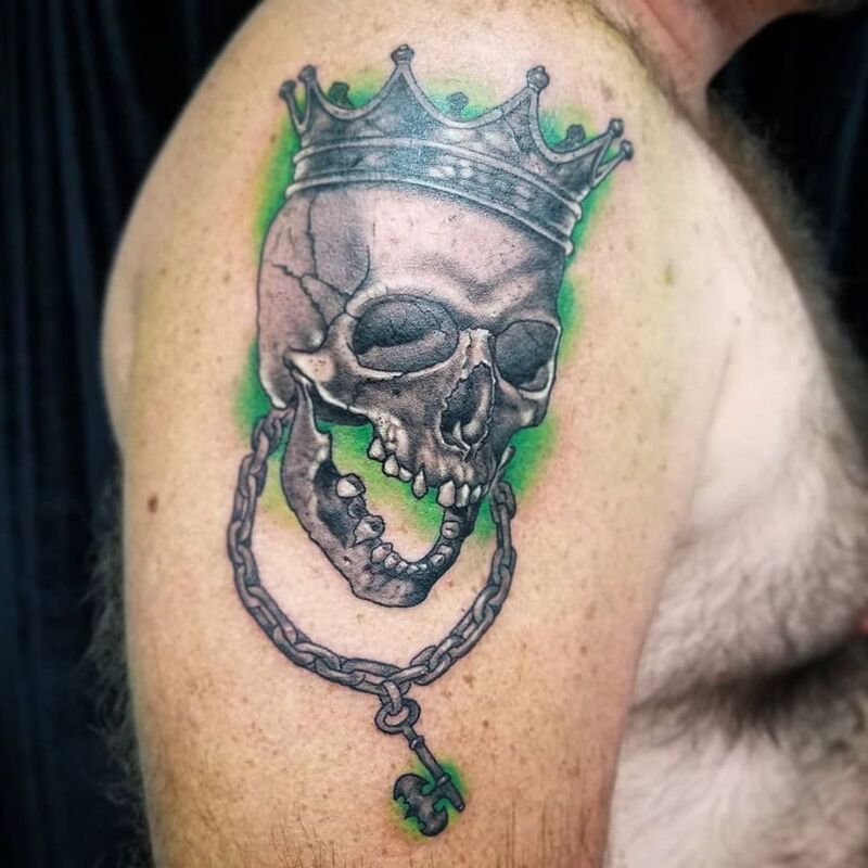 King skull tattoo done at Overlord Tattoo Studio Miami Beach